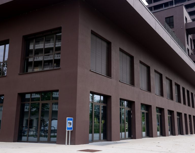 Commercial premises with panoramic windows. Modern Brown facade.